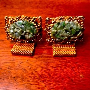 Gorgeous men’s cuff links with green stones.